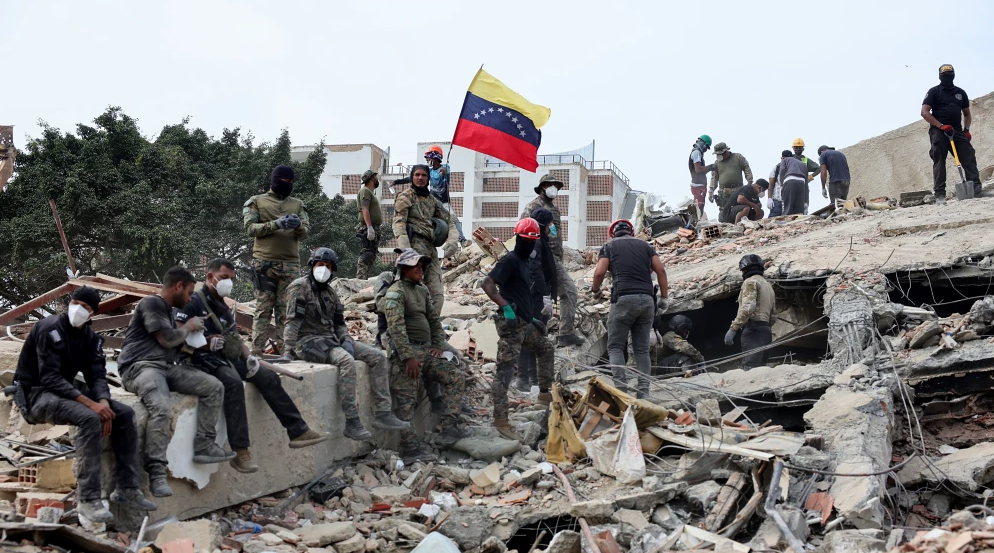 Rescuers search for victims at a collapsed building in Venezuela following a magnitude 7.2 earthquake that struck the country and other regions in the Caribbean, Carabellada, Venezuela, June 28, 2026. Photo by Jesus Vargas/Getty Images.