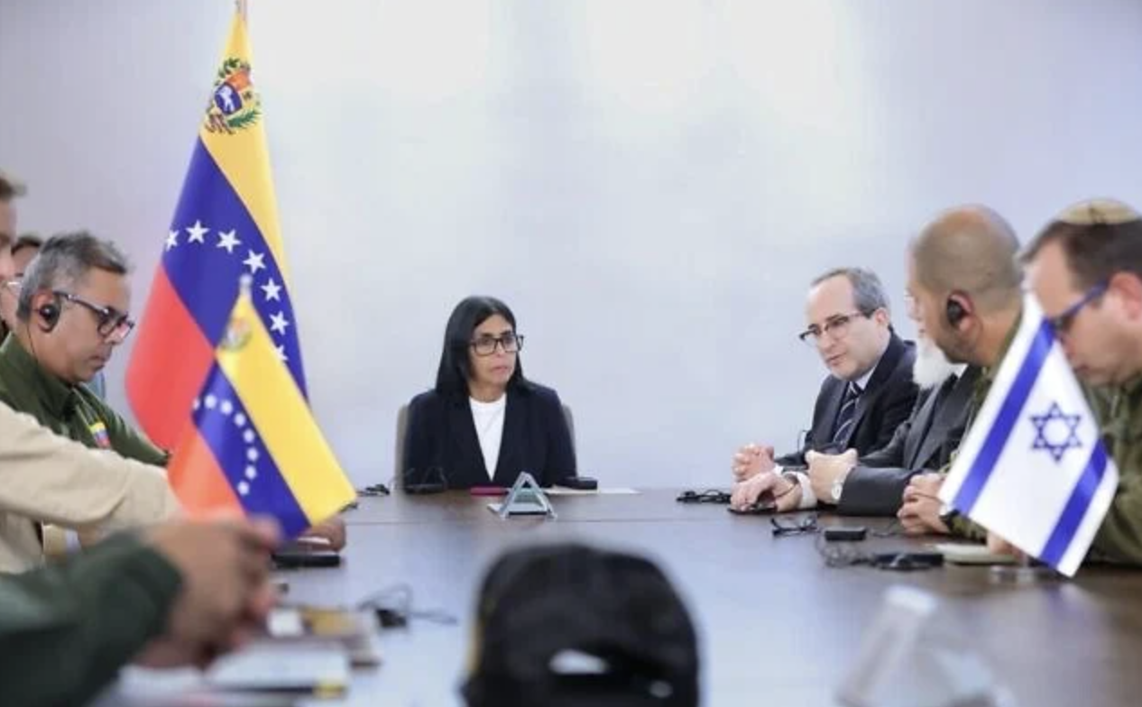 Venezuela's acting President Delcy Rodriguez center, meeting with Israeli representatives in a photo released on July 22, 2026. (IDF Spokesperson)