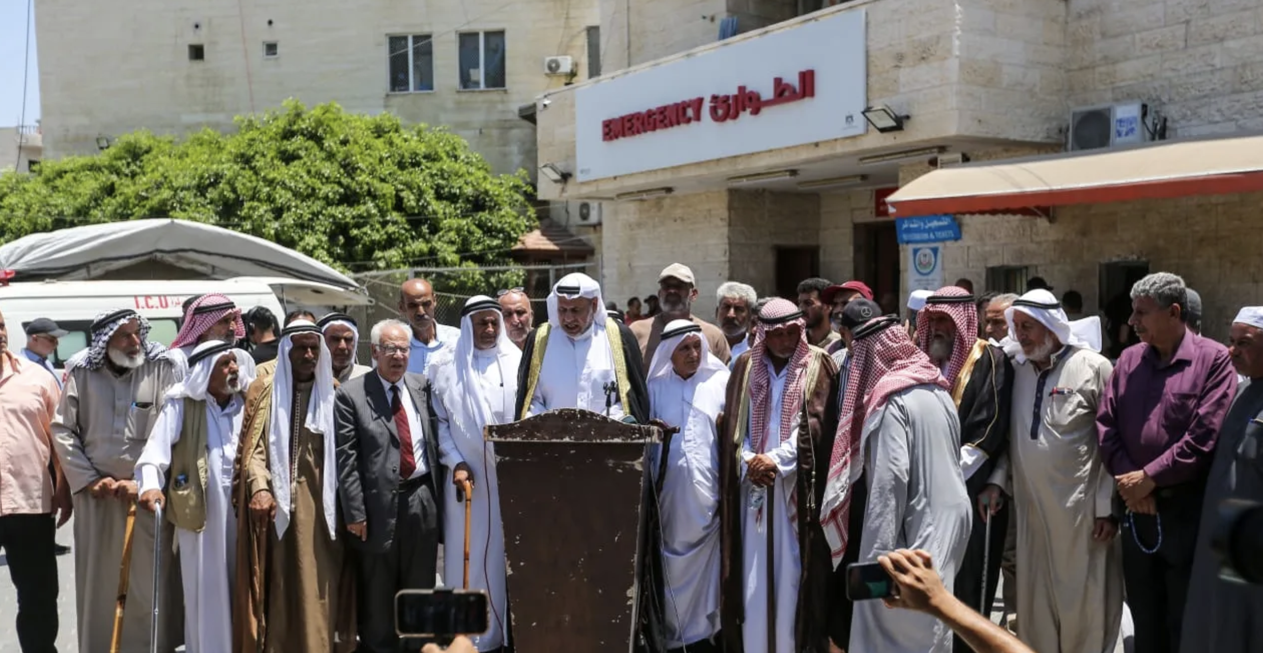 Gazan clan leaders give a press conference discussing Hamas's decision to transfer administrative control of the Gaza Strip to the National Committee for the Management of Gaza, al-Aqsa Martyrs' Hospital, Deir al-Balah, July 6, 2026. (photo credit: Ahmad Hasaballah/Getty Images)