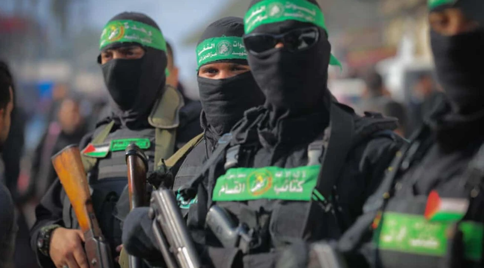 Members of Hamas’s Al-Qassam Brigades at the funeral procession for Hamas military council member Ghazi Abu Tamaa in Deir al-Balah, the central Gaza Strip, Feb. 4, 2025. Photo by Ali Hassan/Flash90.
