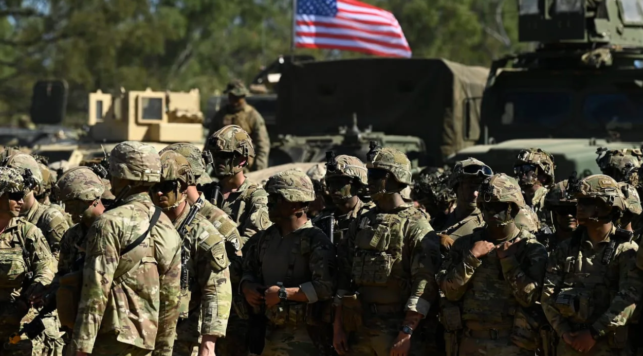 Soldiers from the United States gather together during the opening ceremony of Exercise Southern Jackeroo on May 29, 2026 in Townsville, Australia. (photo credit: Ian Hitchcock/Getty Images)