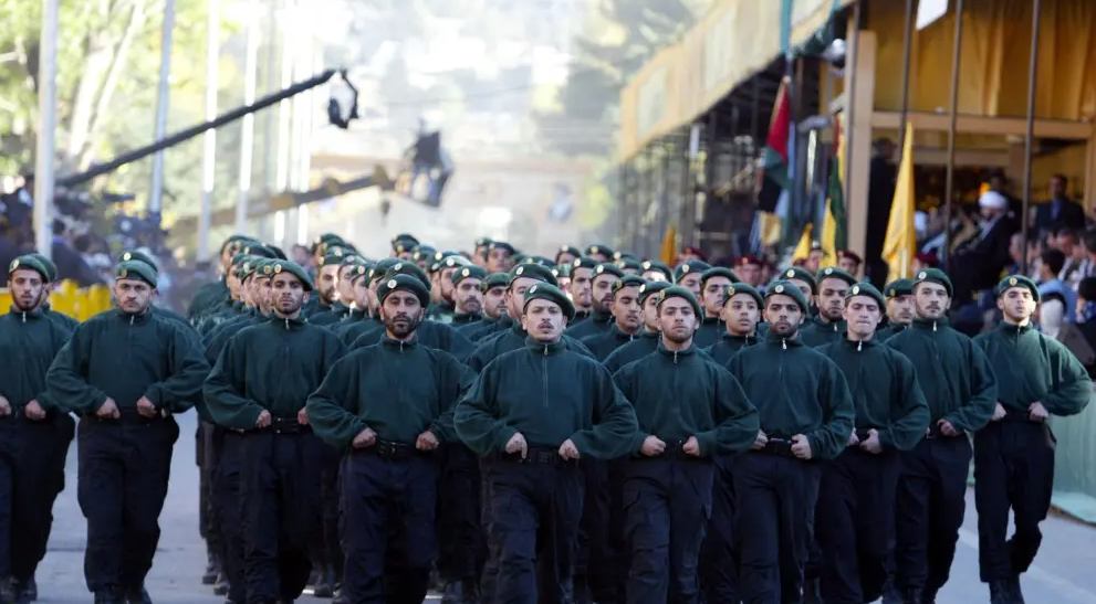 Hezbollah terrorists march during a rally marking Jerusalem Day in Baalbek, eastern Lebanon, Nov. 12, 2004. Photo by Anwar Amro/AFP via Getty Images.