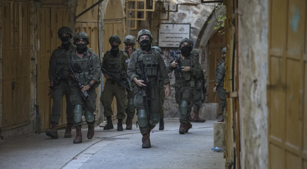 Israel Defense Forces soldiers patrol an alleyway in the Old City of Hebron in Judea on Sept. 5, 2026. Photo by Mosab Shawer/Middle East Images/AFP via Getty Images.