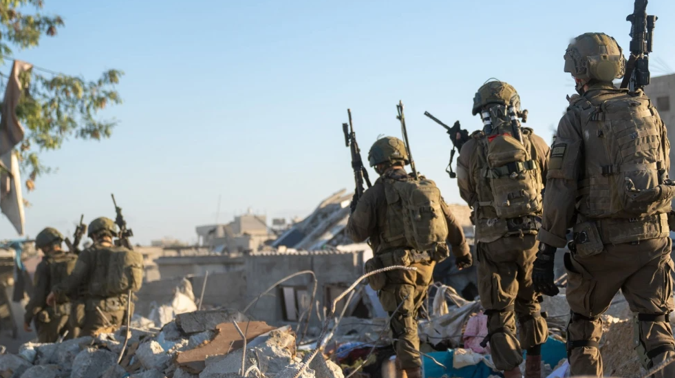 Israeli soldiers operate amid rubble in the Gaza Strip. Credit: IDF.
