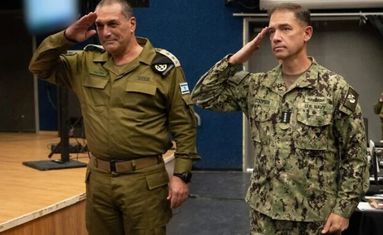 IDF Chief of Staff Lt. Gen. Eyal Zamir, left, and US Central Command chief Adm. Brad Cooper salute during an event in Israel, August 10, 2026. (IDF)