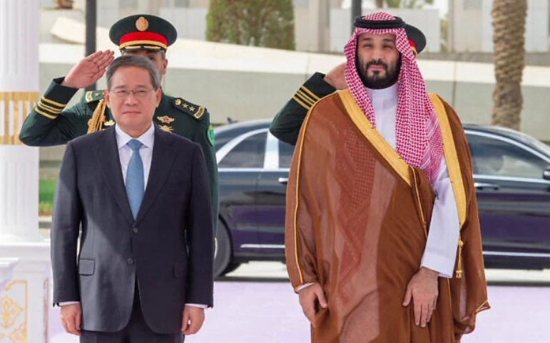 File: A handout picture provided by the Saudi Press Agency (SPA) shows Saudi Crown Prince Mohammed bin Salman welcoming Chinese Prime Minister Li Qiang in Riyadh, on September 11, 2024. (SPA/AFP)