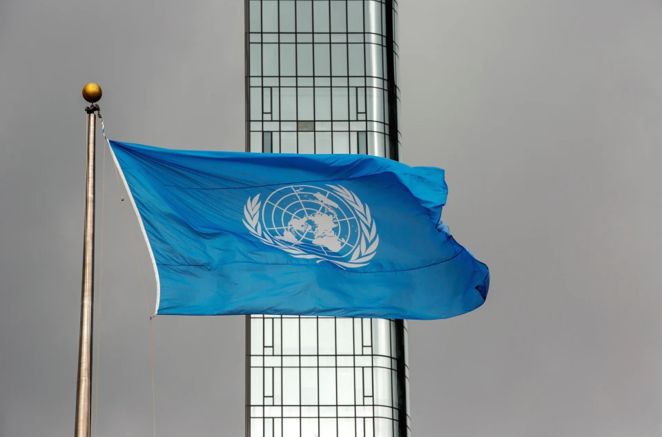 The UN flag flies on a stormy day at the United Nations during the United Nations General Assembly, Sept. 22, 2022. (AP Photo/Ted Shaffrey, File) License this photo