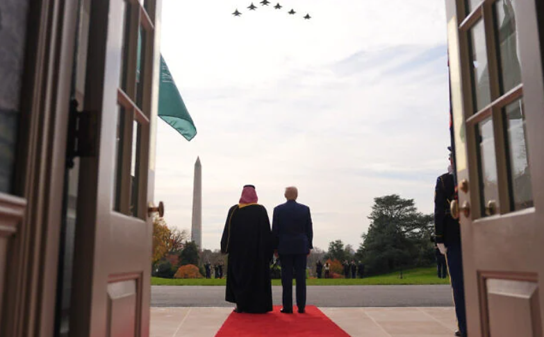 US President Donald Trump (right) and Saudi Arabia's Crown Prince Mohammed bin Salman watch F-35s and F-15s fly over during a welcome ceremony on the South Lawn of the White House, November 18, 2025, in Washington. (AP/Evan Vucci)