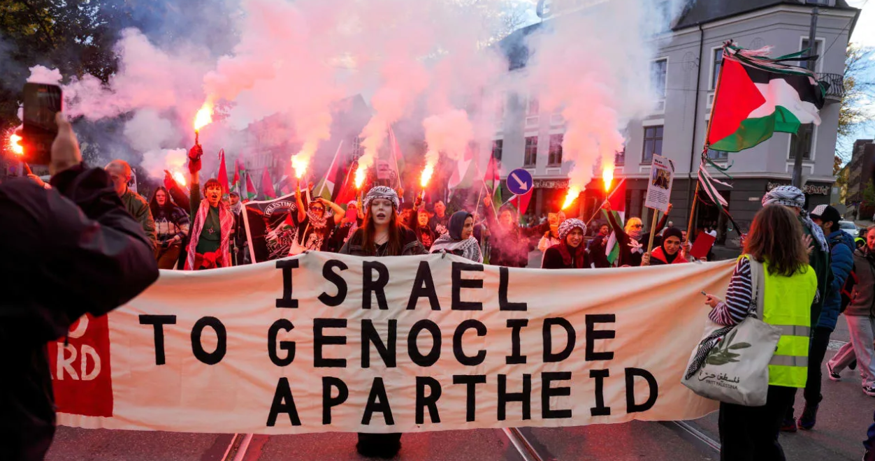Protesters take part in a pro-Palestinian demonstration marching towards Ullevaal Stadium ahead of the World Cup qualifier between Norway and Israel, in Oslo, Norway, October 11, 2025. (photo credit: Javad Parsa/NTB via REUTERS)