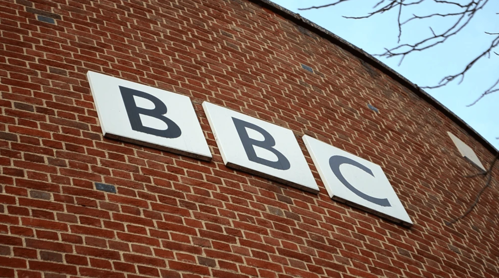 The BBC logo on the side of The Forum building in Norwich, Norfolk, in the United Kingdom, on Dec. 18, 2019. Credit: Sebastiandoe5 via Wikimedia Commons.