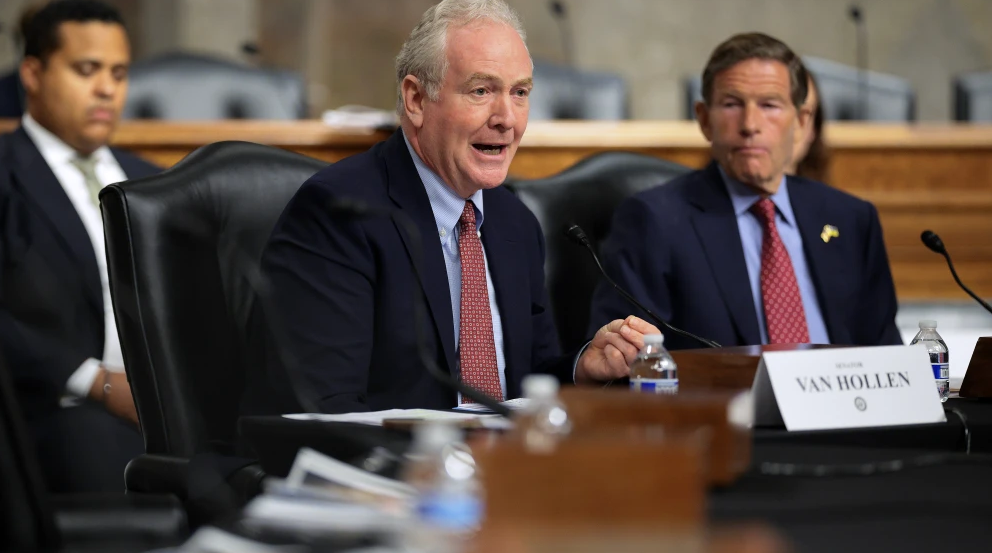 Sen. Chris Van Hollen (D-Md.), center, and Sen. Richard Blumenthal (D-Conn.), right, host a forum to discuss U.S. President Donald Trump’s official and personal dealings with cryptocurrency in the Dirksen Senate Office Building on Capitol Hill in Washington, July 27, 2026. Photo by Chip Somodevilla/Getty Images.