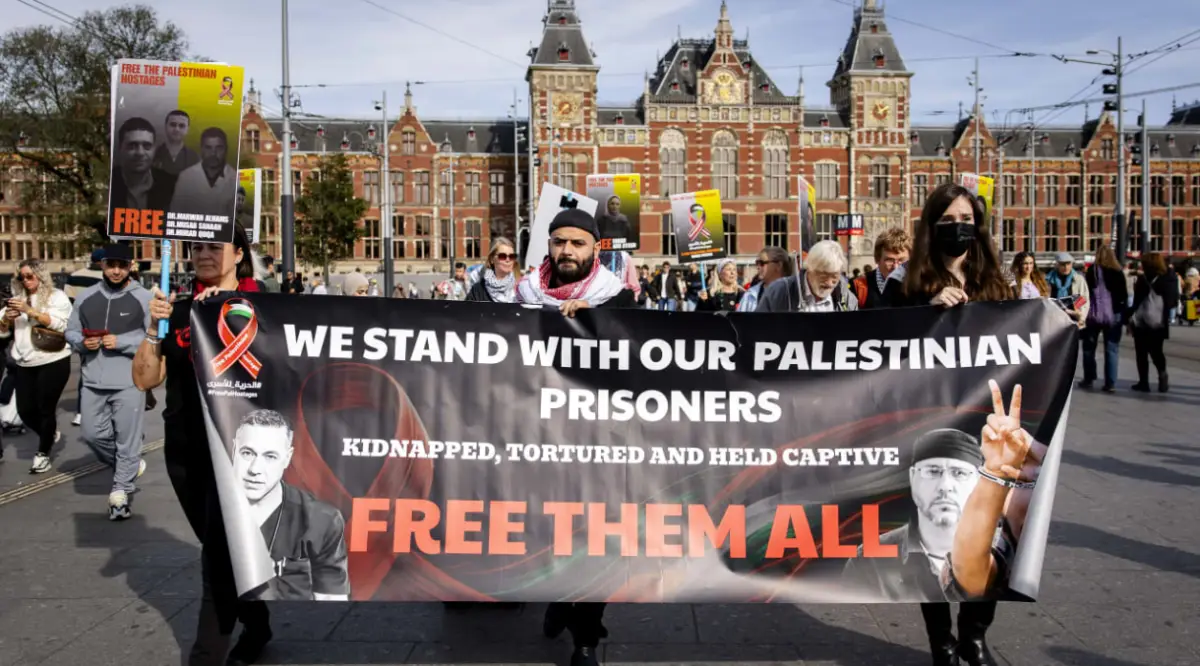 Protesters take part in a demonstration against the sale of products from companies they accuse of being complicit to "genocide, occupation, and apartheid in the Palestinian territories," in Amsterdam on October 3, 2026; illustrative. (photo credit: SEM VAN DER WAL/ANP/AFP via Getty Images)