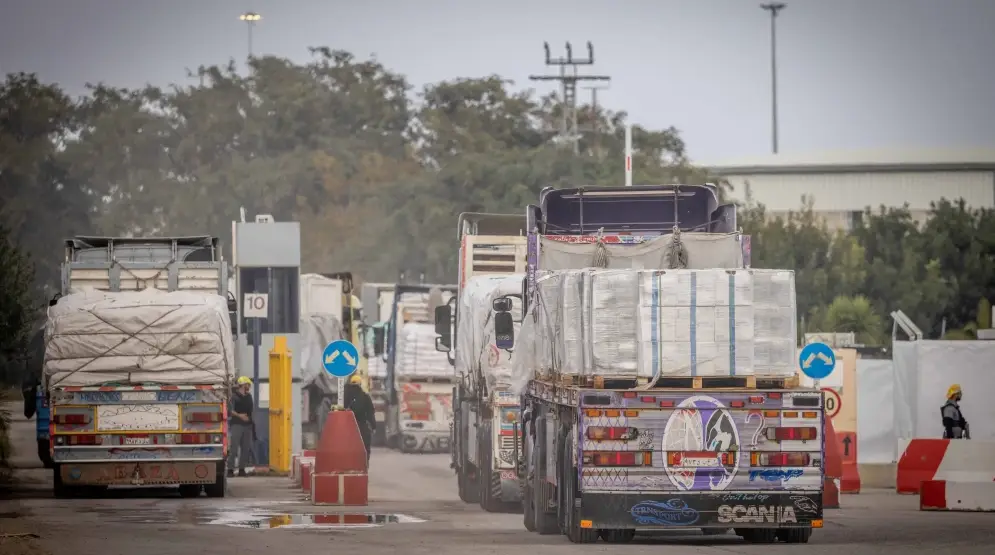 Aid trucks entering the Gaza Strip, at the Kerem Shalom crossing in southern Israel, Jan. 29, 2024. Photo by Chaim Goldberg/Flash90.